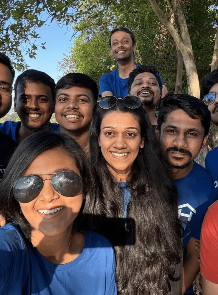 Procedure team selfie outdoors under a tree